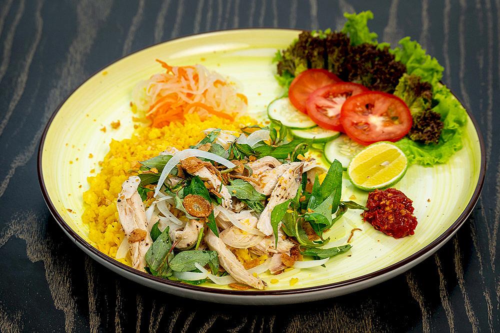 If you're at Hoi An's night market, make sure to try the famous chicken rice